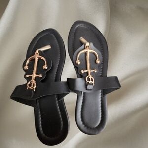 Elegant Black Sandals with Gold Accent